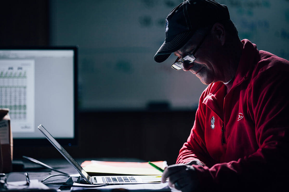 An Armor Seed agronomist researching seed traits