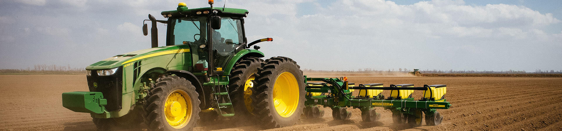 a tractor tilling the farm